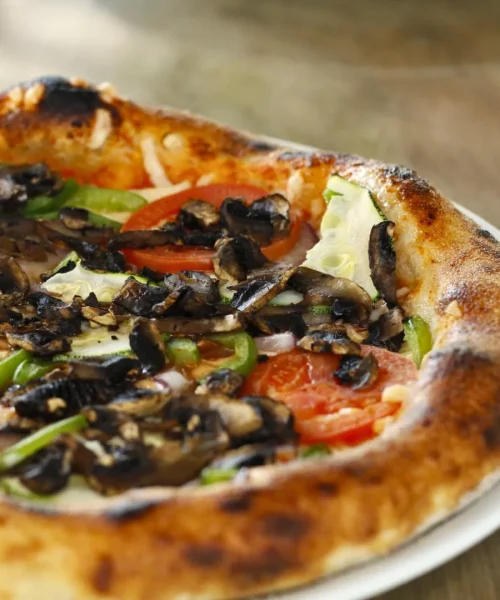 Deliciosas pizzas artesanales estilo italianas en Playa del Carmen