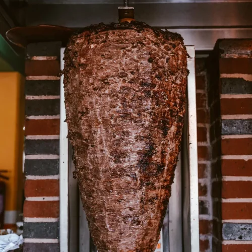 trompo de carne bistec en el fogon playa del carmen